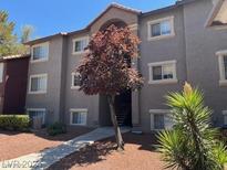 Well-maintained building exterior with landscaping and convenient entryway at 2750 S Durango Dr # 1021, Las Vegas, NV 89117