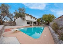 Inviting swimming pool with diving board, surrounded by a well-maintained patio at 2923 Palora Ave, Las Vegas, NV 89121